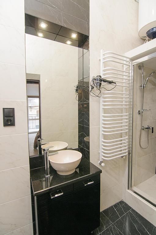 Апартаменты Central Studio Apartments 