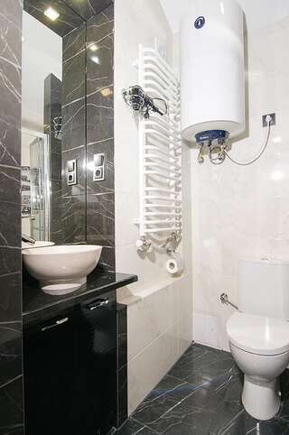 Апартаменты Central Studio Apartments 
