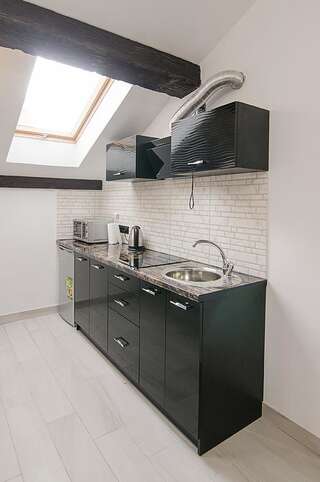 Апартаменты Central Studio Apartments 