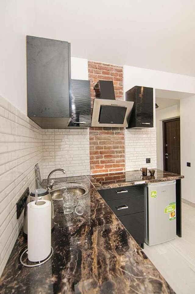 Апартаменты Central Studio Apartments 