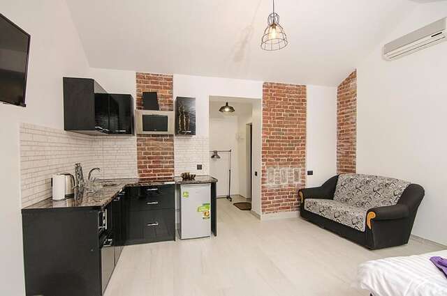 Апартаменты Central Studio Apartments 